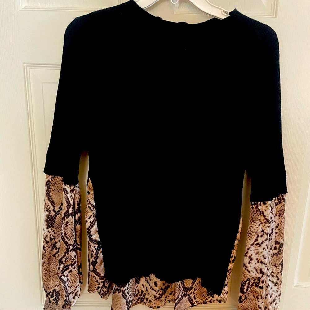 Super cute layered look sweater. NWOT